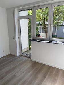 21_Raum_01_Wohnzimmer_Küche_Terrasse.jpeg